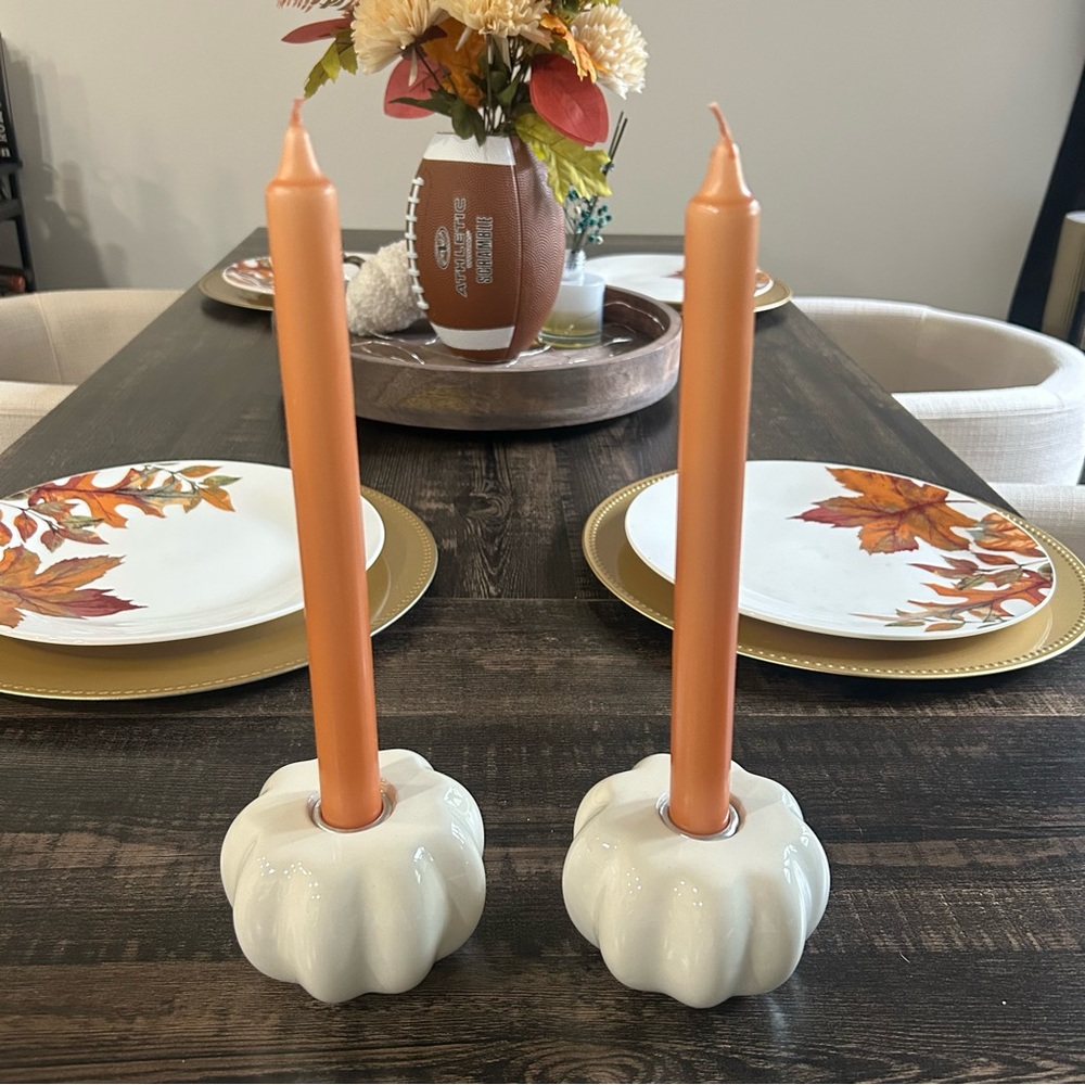 Pumpkin candle holder with orange candles